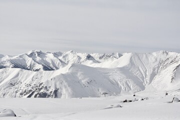 Snow covered peaks of Georgian ski resort, Caucasus mountain range black and white photo