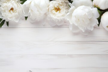 Obraz na płótnie Canvas Flat lay of white peony flowers with copyspace on wooden background