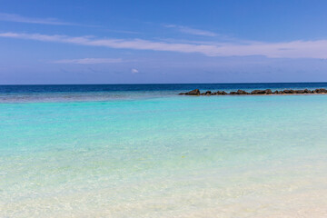 Azure water in the lagoon of the tropical island in the Maldives