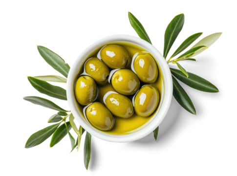 Green olives in olive oil with leaves isolated on white or transparent background, top view