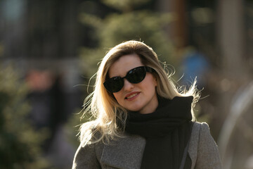 Beautiful fashion girl in sunglasses. Close-up portrait