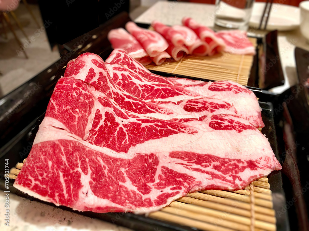 Wall mural raw wagyu meat on bamboo for hot pot/shabu shabu