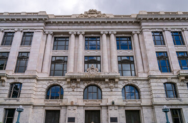 Fototapeta na wymiar Facade of the Chief Justice Pascal F Calogero Jr Courthouse in New Orleans Louisiana housing Supreme Court
