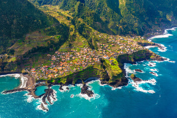 Aerial view of Madeira island. Land meets ocean in Seixal, Madeira, Portugal - obrazy, fototapety, plakaty