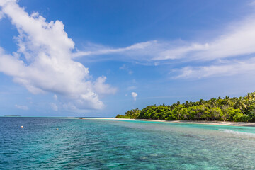 Azure water in the lagoon of the tropical island in the Maldives