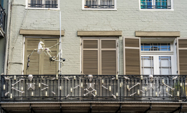 Halloween decorations on tradional New Orleans building in the French Quarter with wrought iron balconies
