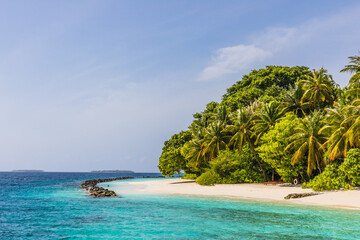 Azure water in the lagoon of the tropical island in the Maldives