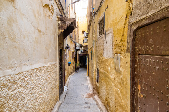 Fes, Morocco. View of the narrow and suggestive alleys in the ancient souk of the medina in Fes in Morocco.