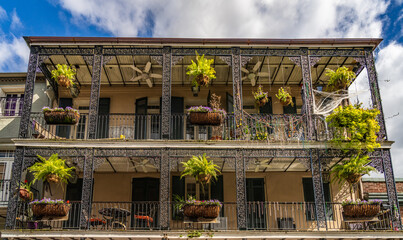 Halloween decorations on tradional New Orleans building in the French Quarter with wrought iron balconies