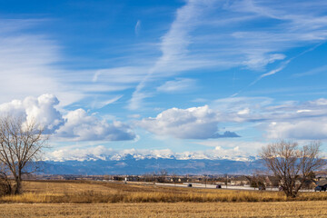 Colorado Living. Loveland, Colorado - Denver Metro Area Residential Winter Panorama with the view of Front Range mountains in the distance