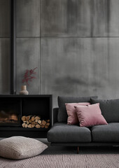 Grey sofa with pink pillows and fur blanket by freestanding fireplace. Scandinavian cozy home interior design of modern industrial style living room. copy space.