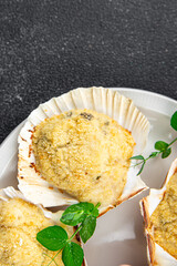 scallop souffle crustacean seafood Saint Jacques terrine baked stuffed fresh delicious eating cooking appetizer meal food snack on the table copy space food background rustic top view