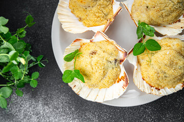 scallop souffle crustacean seafood Saint Jacques terrine baked stuffed fresh delicious eating cooking appetizer meal food snack on the table copy space food background rustic top view