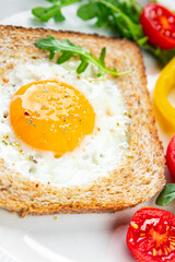 toast fried egg bread scrambled yolk protein breakfast food fresh eating cooking appetizer meal food snack on the table copy space food background rustic top view