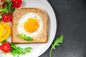 toast fried egg bread scrambled yolk protein breakfast food fresh eating cooking appetizer meal food snack on the table copy space food background rustic top view