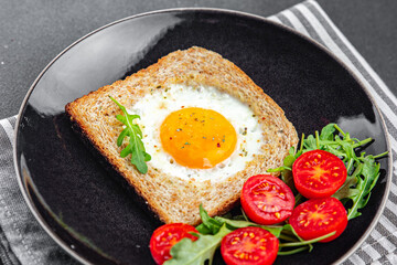 toast fried egg bread scrambled yolk protein breakfast food fresh eating cooking appetizer meal food snack on the table copy space food background rustic top view