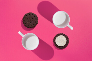 cookie and milk pattern on pink background