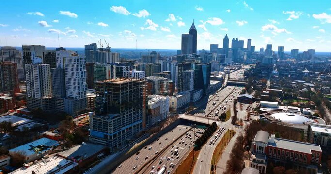 Picturesque bright urban landscape on sunny day. Drone footage of Atlanta, Georgia, USA under azure sky.
