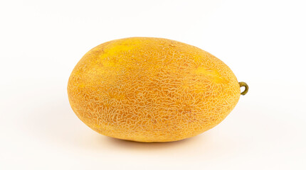 Ripe yellow melon on a white background.