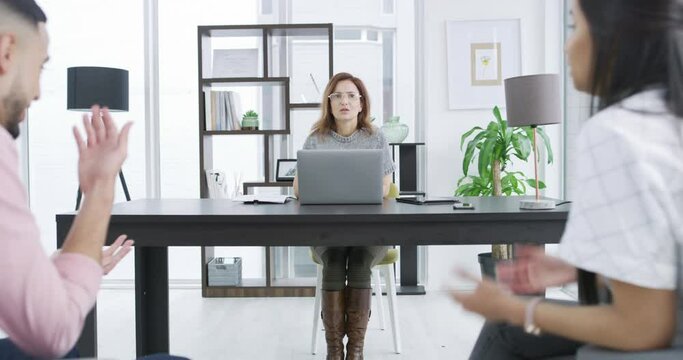 Frustrated couple, fight and psychologist with laptop in therapy session for conflict, disagreement or argument. Angry man and woman in toxic relationship with shrink or therapist for help in dispute