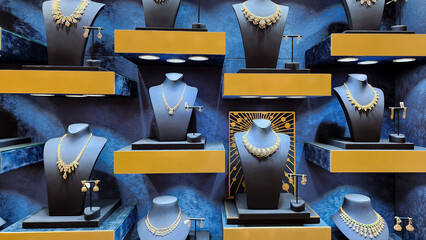 gold and diamond jewellery kept at display at a store.