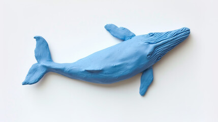 Funny blue whale formed from plasticine on white background