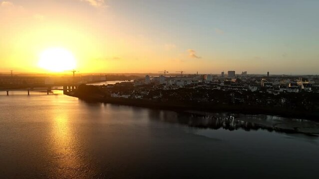 Lorient's bridges unite under a morning sky.