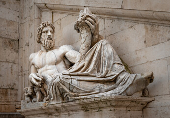 The ancient statue of Tiberinus (god of the river Tiber) holding a cornucopia (the horn of plenty)....