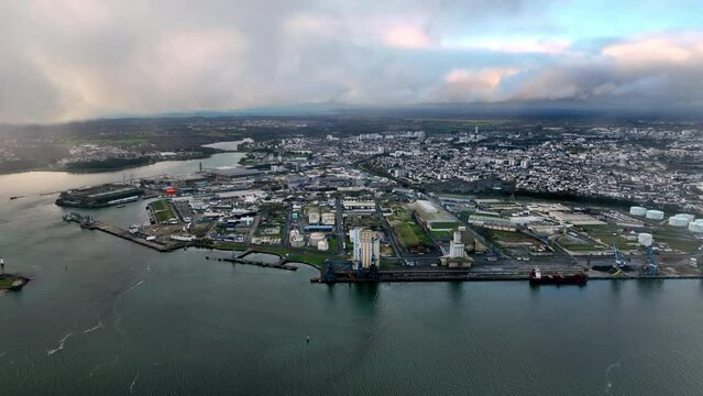 Cloudy skies cast over Lorient's peaceful waters.