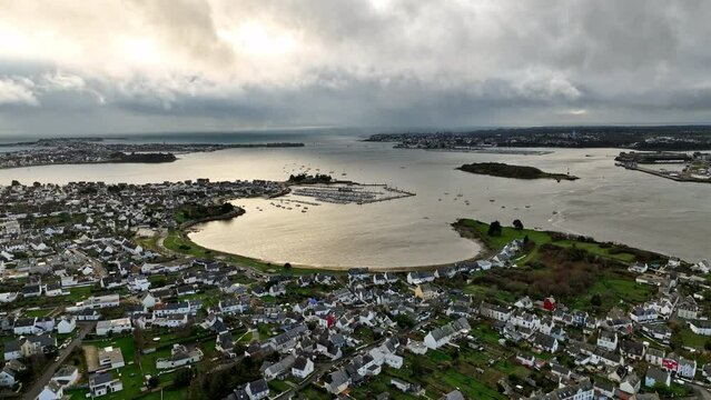 Overcast skies over Lorient's coastal bay.