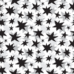Hand drawn black and gray stars on white background seamless pattern