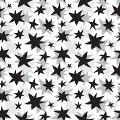Hand drawn black and gray stars on white background seamless pattern