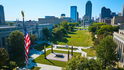 Naklejka premium Aerial View of American Flag and Urban Park in Indianapolis