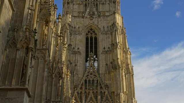 Closeup architecture detail of the Stephansdom or St. Stephen Cathedral facade and south tower(S&uuml;dturm), Vienna, Austria 