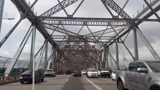 Traffic on Story Bridge Brisbane Queensland Australia.It's a heritage-listed steel cantilever bridge spanning Brisbane River carries an average of 97,000 vehicles each day.