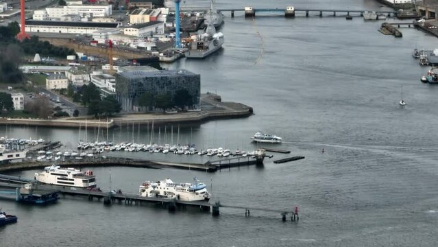 Cloudy dawn breaking over Lorient's docks.