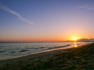 Golden Sunset Over Peaceful Beach Shore