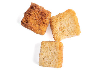 Heaps of delicious crispy fried croutons isolated on white, set