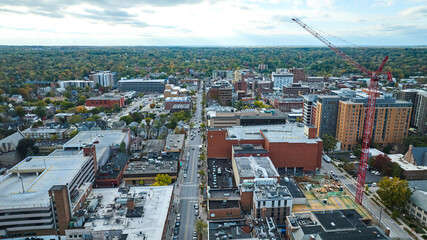 Aerial Urban Growth: Red Crane and Cityscape, Ann Arbor