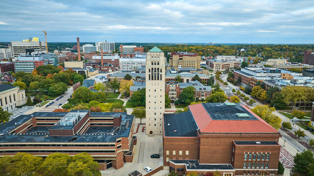 Aerial View of Burton Memorial Tower Amidst Autumn Cityscape, Ann Arbor - Powered by Adobe