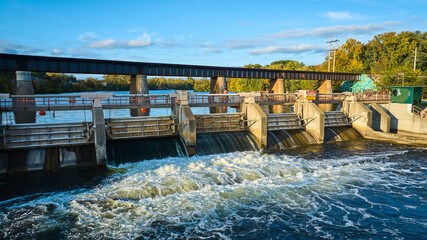 Aerial View of Argo Dam and Railway Bridge at Golden Hour