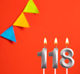 Birthday candle number 118 - Invitation card in orange background
