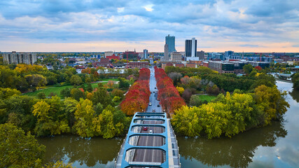Aerial Autumn Cityscape with Tree-Lined Boulevard and Skyline
