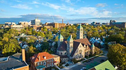 Aerial View of Historic Church and Urban Neighborhood at Golden Hour, Michigan