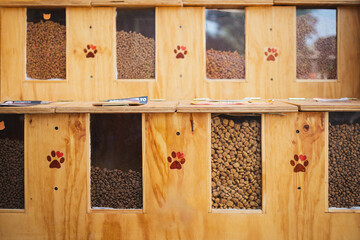 Different types of pet food at a pet shop in Chile. Food for dogs and cats.