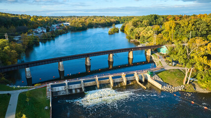 Aerial View of Railway Bridge and Dam on Huron River in Autumn