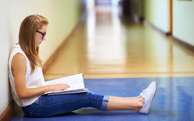 Woman, teenager and student reading book in hallway at school for learning, education or studying....