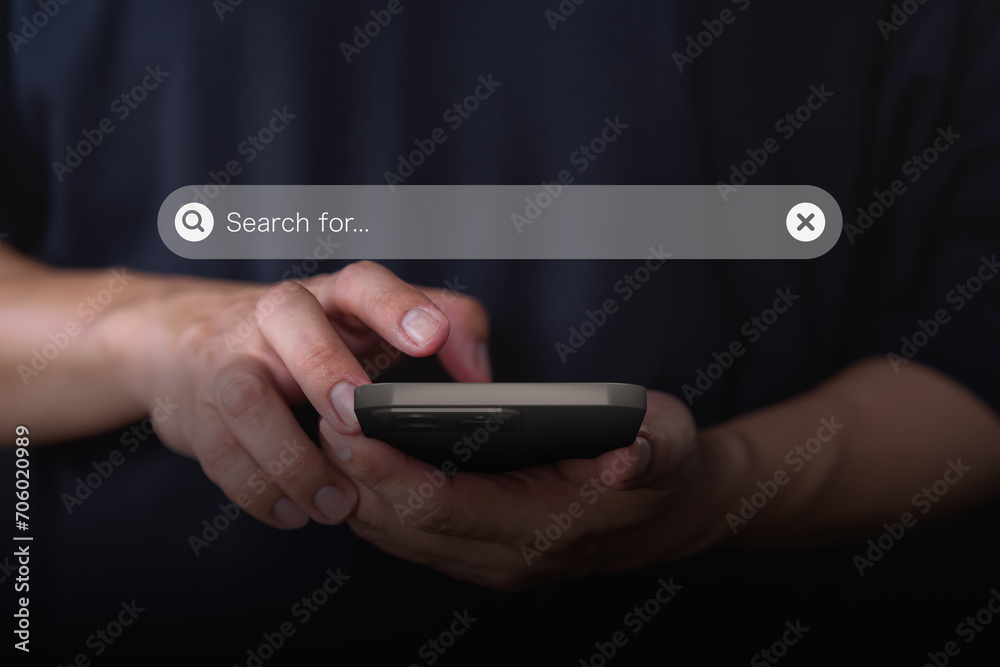Poster Male hand using a smartphone for internet search bar. SEO technology networking engine optimization internet with search bar. Searching browsing internet data information concept.