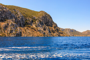 Fototapeta premium View of the sea from an excursion yacht. Background with selective focus and copy space