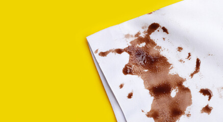 Dirty choclate stain on white shirt